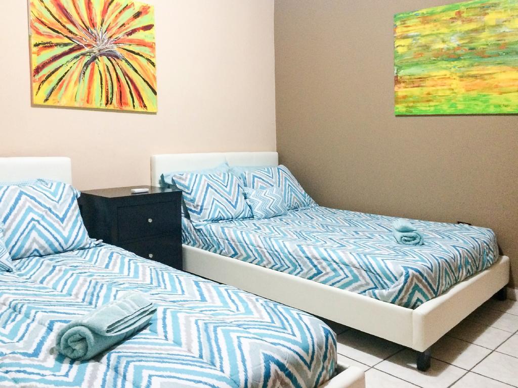 Coastal Express Inn & Suites #1 At 681 Ocean Drive Islote Habitación foto